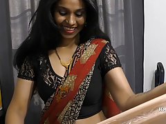 Big ass, Indian woman is slowly getting naked in front of the camera and teasing a bit