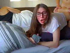 Nerdy teen brunette with glasses is getting fucked from the back in the middle of the day