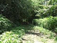 Amateur woman is masturbating in the nature, during the day and moaning from pleasure while cumming